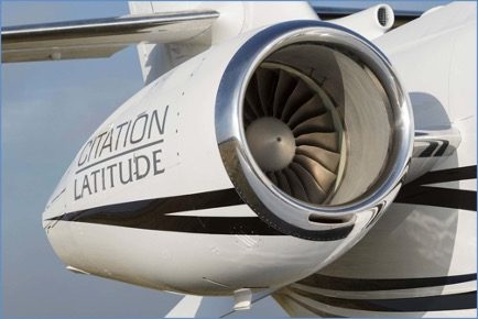 Pratt & Whitney PW306D1 FADEC-controlled turbofan engine with dark blue stripes and the words “CITATION LATITUDE” written on the side in gray lettering. 